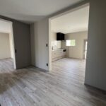 From entrance looking at kitchen and livingroom